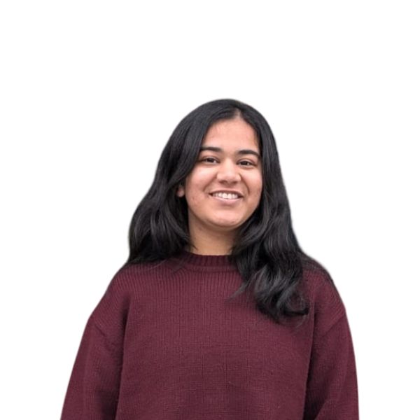 Angel Garg's professional headshot, smiling confidently
